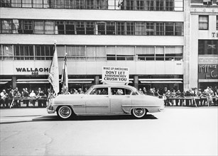 Car displaying protest poster opposing Soviet Leader Nikita Khrushchev
