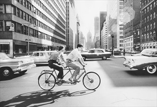 Couple riding Tandem Bicycle