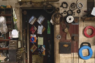 Old Tool Shed with Objects hanging from Wall