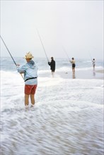 Four People Fishing