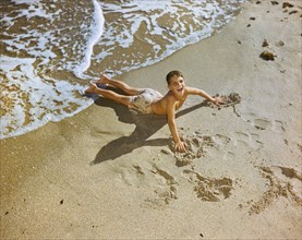High Angle View of Young Boy on Beach