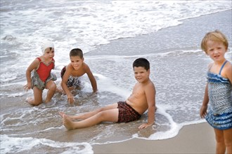 Four Young Children at Beach