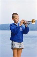 Boy playing Trumpet at Summer Camp