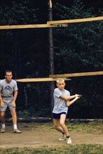 Young Boy playing Baseball at Summer Camp