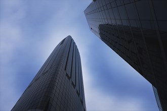Low Angle View of Two Modern Glass Buildings