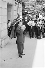 Alabama Governor George Wallace standing at door of Foster Auditorium