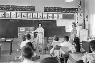 Cuban Refugee Students and Teacher in Classroom