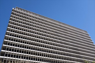 Modern Office Building Exterior against Blue Sky
