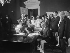 U.S. President Woodrow Wilson signing Keating-Owen Child Labor Act