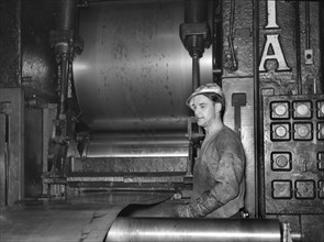 Steel worker at rolling mill