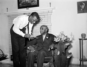 Dr. George Washington Carver talking to member of Reserve Officers Training Corps