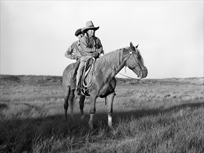 Cheyenne Indian and son on horse