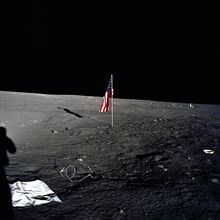 American flag after it was unfurled on lunar surface during  extravehicular activity during Apollo 12 manned lunar landing mission