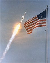 Lift-off of Apollo 11 manned spacecraft with American flag