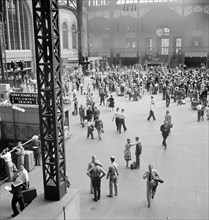 Main concourse, Pennsylvania Station, New York City, New York, USA, Marjory Collins, U.S. Office of