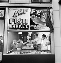 Customers at Jaffe's Fish Market in Jewish neighborhood, New York City, New York, USA, Marjory