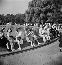 Group of people sitting around Mall Fountain, Central Park, New York City, New York, USA, Marjory