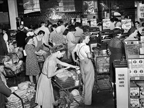 Customers lined up at cash registers, Giant Food Shopping Center, Wisconsin Avenue, Washington, D.C