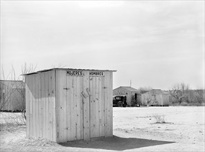 Privy for men and women, Crystal City, Texas, USA, Russell Lee, U.S. Farm Security Administration,