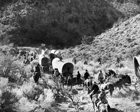 Covered wagon train, on-set of the film, "Brigham Young", 20th Century-Fox, 1940