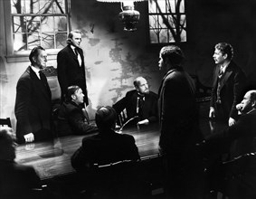 Dean Jagger (standing, 2nd left), Brian Donlevy (standing, far right), on-set of the film, "Brigham