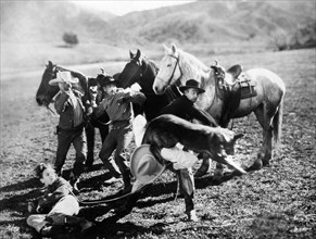 Maurice Murphy (on ground), Edmund Cobb, Dynamite the dog, on-set of the silent film, "The Call Of