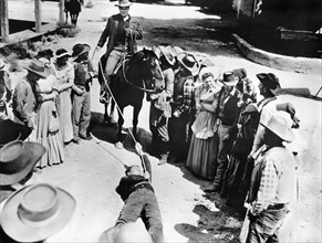 Joel McCrea (on horse), on-set of the film, "Cattle Empire", 20th Century-Fox, 1958