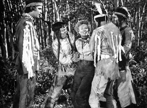 Lance Fuller (left), Barbara Stanwyck, on-set of the film, "Cattle Queen of Montana", RKO Radio