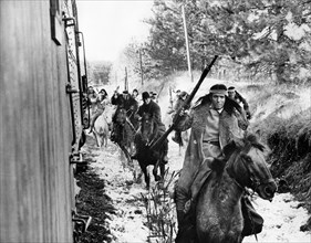 Native American bandits attempting train robbery, on-set of the film, "Breakheart Pass", United