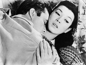 Dirk Bogarde, Yoko Tani, on-set of the film, "The Wind Cannot Read", Rank Film Distributors, 1958,