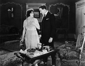 Vivian Rich, Aaron Edwards, on-set of the silent film, "A World Of Folly", Fox Film Corporation,