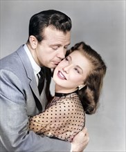 Dick Powell, Peggy Dow, publicity portrait for the film, "You Never Can Tell", Universal Pictures,