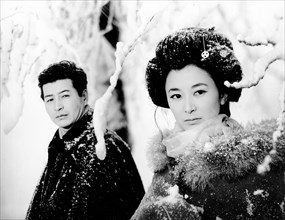 Keiko Kishi, Ryo Ikebe, on-set of the Japanese film, "Yukiguni", English title: "Snow Country",