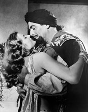 Anita Ekberg, Victor Mature, on-set of the film, "Zarak", Columbia Pictures, 1956