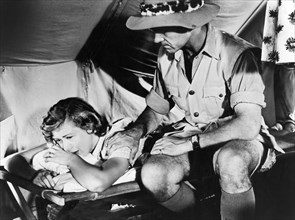 Dinah Sheridan, Anthony Steel, on-set of the British film, Where No Vultures Fly", released in U.S.