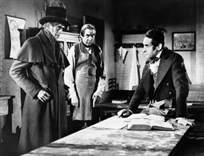 Boris Karloff, Bela Lugosi, Henry Daniel, on-set of the film, "The Body Snatcher", RKO Radio