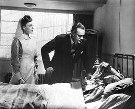 Judy Kelly, Robert Wyndham, Anthony Baird, on-set of the British film, "Dead Of Night", Eagle Lion