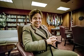 Donna Shalala, U.S. Secretary of Health and Human Services, half-length portrait seated in her