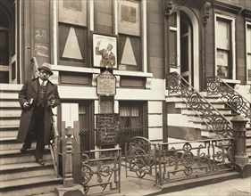 Man standing on steps, Church of God, 25 East 132nd Street, New York City, New York, USA, Berenice