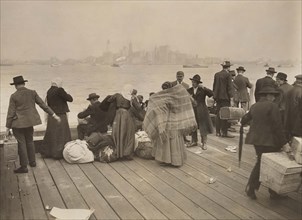 Immigrants waiting to be transferred, Ellis Island, New York City, New York, USA, Underwood &