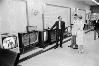 Couple shopping for a television, Woodward & Lothrop department store, Washington, D.C., USA,