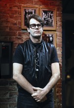 American actor Dan Aykroyd, half-length portrait, on-set of MTV Music Television, New York City,