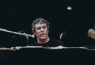 Burt Bacharach, American composer and pianist, half-length portrait during rehearsal, Long Island,