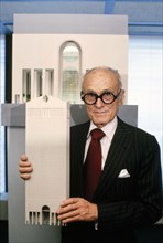 American architect Philip Johnson holding a model of AT&T building, New York City, New York, USA,