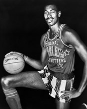 American professional basketball player Wilt Chamberlain wearing Harlem Globetrotters uniform, Fred