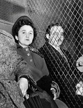 Ethel and Julius Rosenberg, separated by heavy wire screen as they leave U.S. Court House after