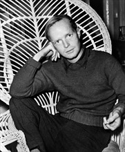 Truman Capote (1924-1984), American novelist, screenwriter, playwright and actor, half-length