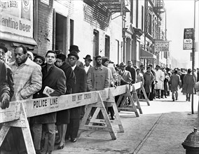 Group of people lined up to pay their respects at the funeral of Malcolm X, Unity Funeral Chapel,