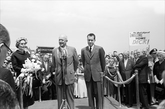 U.S. President Dwight Eisenhower welcoming home U.S. Vice President Richard Nixon and his wife Pat