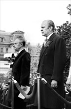 U.S. President Gerald Ford standing with Liam Cosgrave, Prime Minister of Ireland, outside the